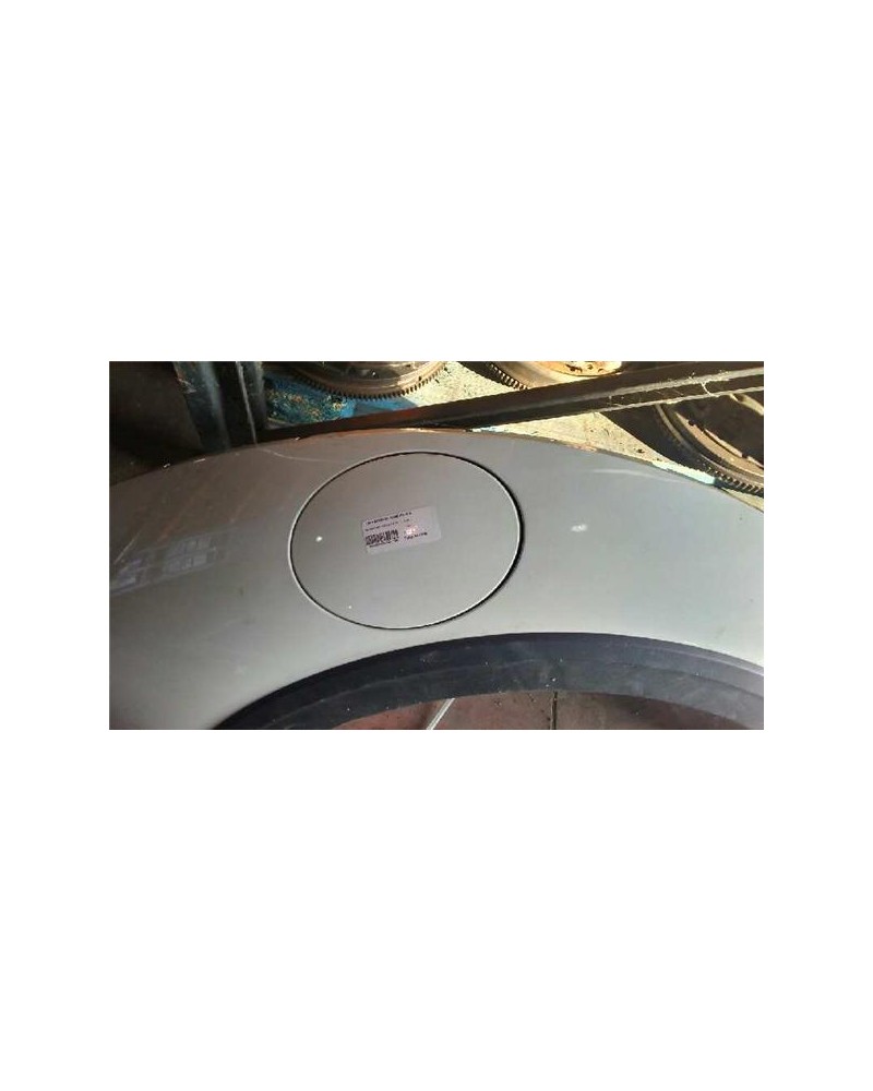 TAPA EXTERIOR COMBUSTIBLE