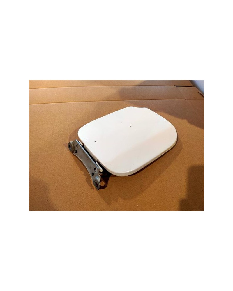 TAPA EXTERIOR COMBUSTIBLE