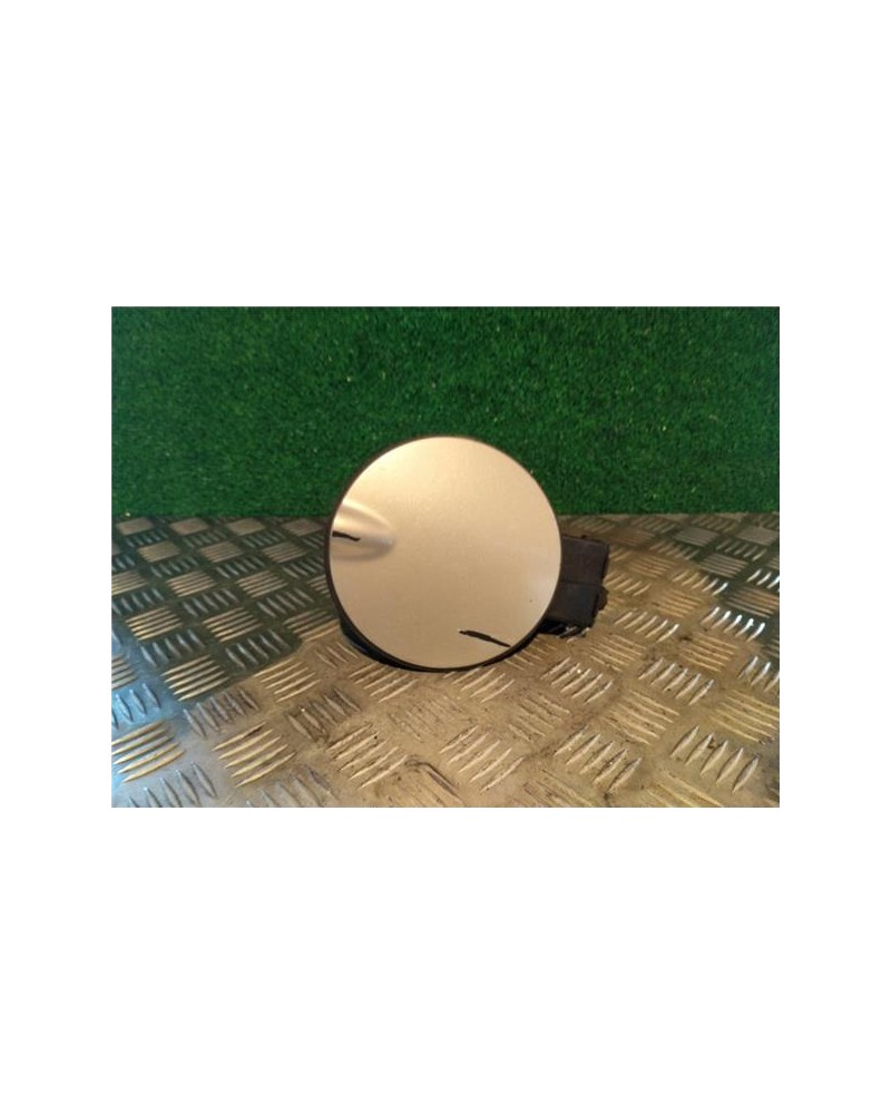 TAPA EXTERIOR COMBUSTIBLE