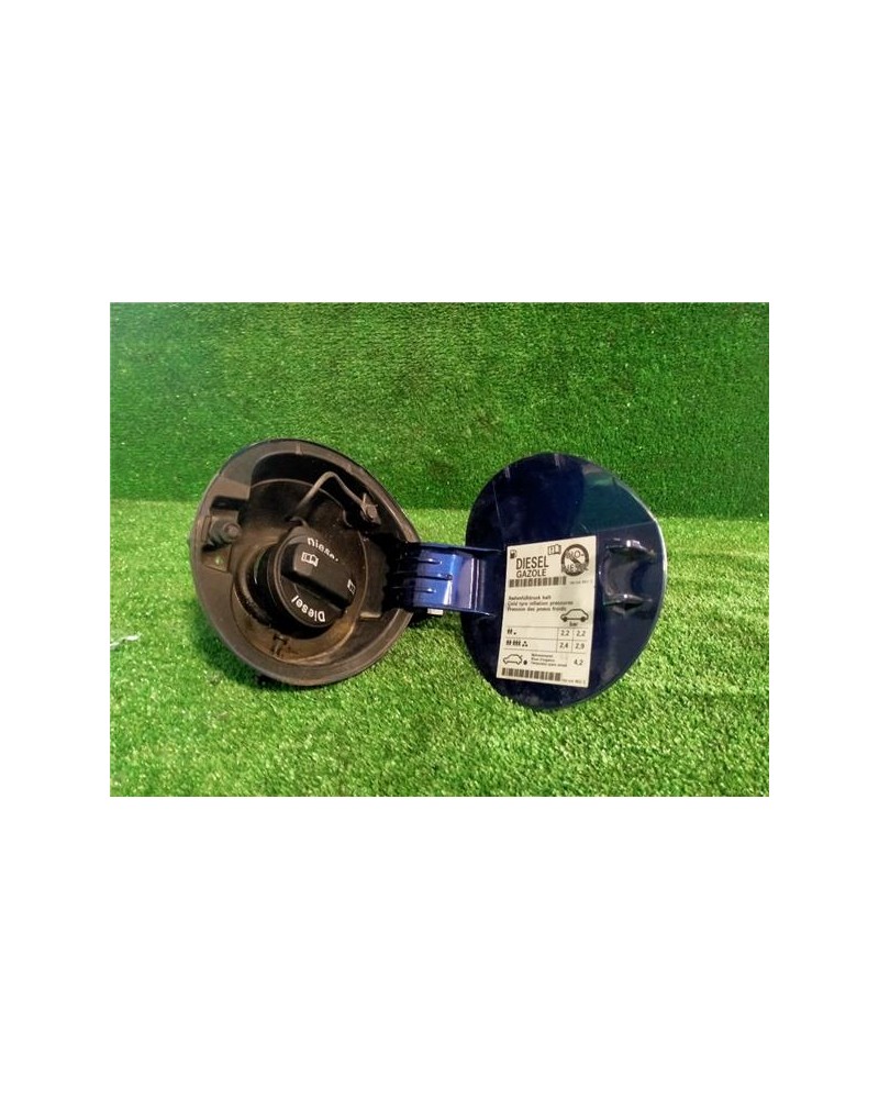 TAPA EXTERIOR COMBUSTIBLE
